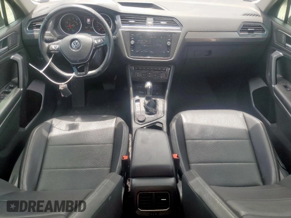 2018 Volkswagen Tiguan SEL with VIN 3VV2B7AX6JM017523, listed as a Copart auction lot 56386545 with 42,620 mi miles and Salvage title. Bid and sale history available at DreamBid. Image 8.