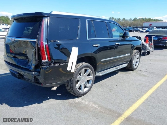 2015 Cadillac Escalade Luxury with VIN 1GYS4MKJ7FR607778, listed as a IAAI auction lot 41786288 with 140,374 mi miles. Bid and sale history available at carsss.com. Image 4.