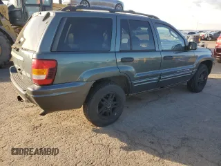 2004 Jeep Grand Cherokee with VIN 1J8GW48N24C304268, listed as a Copart auction lot 45559065 with 252,903 mi miles and Salvage title. Bid and sale history available at DreamBid. Image 3.
