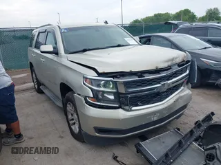 2015 Chevrolet Tahoe LS with VIN 1GNSKAKC7FR258110, listed as a IAAI auction lot 42519375 with 213,981 mi miles and . Bid and sale history available at DreamBid. Image 1.