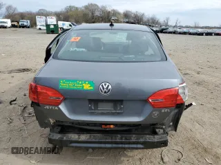 2014 Volkswagen Jetta SEL z VIN 3VWL17AJ9EM441590, wystawiony jako Copart lot #50995785 z przebiegiem Nie podano mil oraz Szkoda całkowita • Salvage title. Historia ofert i sprzedaży dostępna na DreamBid. Obrazek 6.