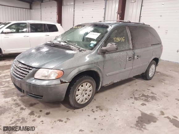 2005 Chrysler Town & Country with VIN 1C4GP45R35B313449, listed as a IAAI auction lot 41286426 with 87,374 mi miles. Bid and sale history available at carsss.com. Image 2.