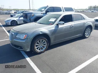 2012 Chrysler 300 Limited with VIN 2C3CCACG9CH199587, listed as a IAAI auction lot 41912142 with 158,065 mi miles. Bid and sale history available at carsss.com. Image 2.