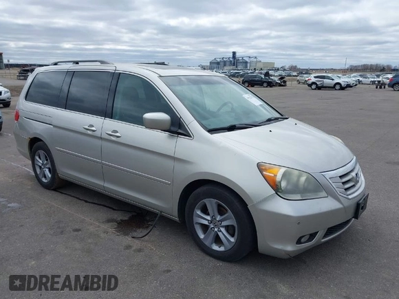 2008 Honda Odyssey Touring with VIN 5FNRL38928B109012, listed as a IAAI auction lot 41922712 with 241,589 mi miles. Bid and sale history available at carsss.com. Image 1.