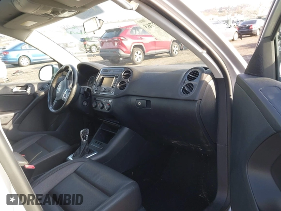 2013 Volkswagen Tiguan S with VIN WVGAV3AX0DW572915, listed as a IAAI auction lot 41937763 with 65,136 mi miles and . Bid and sale history available at DreamBid. Image 5.