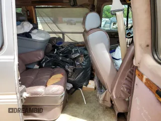 1993 GMC Vandura z VIN 1GDEG25KXPF515257, wystawiony jako Copart lot #56179665 z przebiegiem 308 324 mil mil oraz Szkody całkowita. Historia ofert i sprzedaży dostępna na DreamBid. Obrazek 11.
