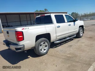 2014 Chevrolet Silverado 1500 LTZ with VIN 3GCUKSEC6EG431603, listed as a IAAI auction lot 41876132 with 99,062 mi miles. Bid and sale history available at carsss.com. Image 4.