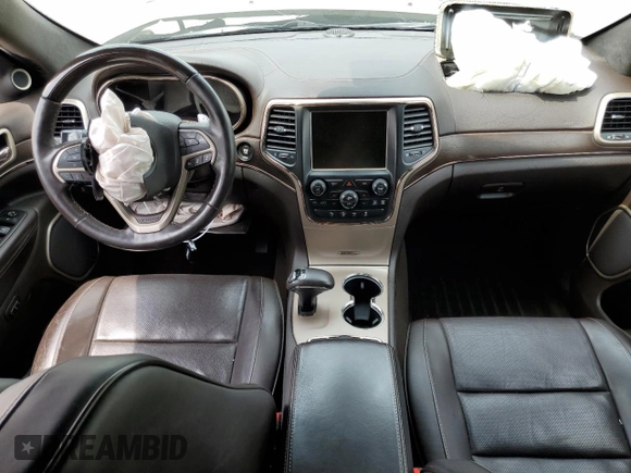 2014 Jeep Grand Cherokee Summit с VIN 1C4RJFJGXEC436797, выставлен на аукционе Copart как лот 60248595 с пробегом 156 395 миль миль и Списание • Salvage title. История ставок и продаж доступна на DreamBid. Изображение 8.