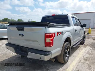 2019 Ford F-150 XL with VIN 1FTEW1E55KKC58276, listed as a IAAI auction lot 42133235 with 97,032 mi miles. Bid and sale history available at carsss.com. Image 4.