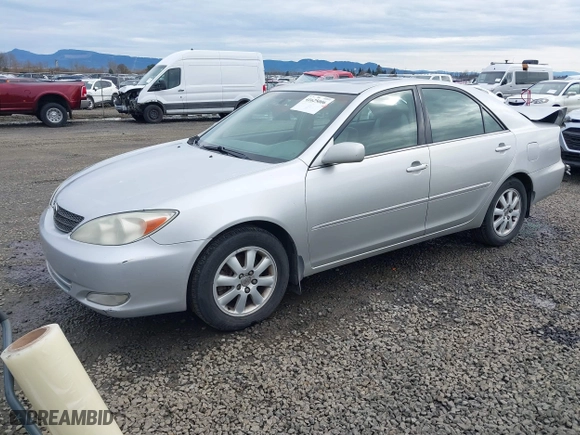 2004 Toyota Camry LE with VIN 4T1BF32K44U585697, listed as a IAAI auction lot 41625006 with 223,434 mi miles. Bid and sale history available at carsss.com. Image 18.