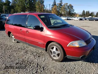 2002 Ford Windstar Sport Standard with VIN 2FMZA57452BB86657, listed as a Copart auction lot 79282034 with 212,681 mi miles and Salvage Title. Bid and sale history available at carsss.com. Image 4.