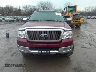 2005 Ford F-150 XLT with VIN 1FTPW14565KE49963, listed as a IAAI auction lot 41709433 with 202,322 mi miles. Bid and sale history available at carsss.com. Image 12.