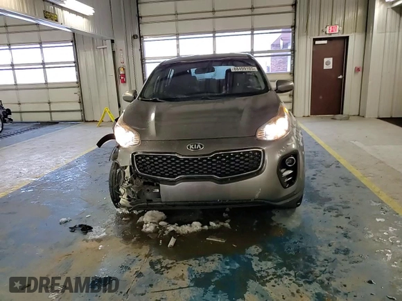 2017 Kia Sportage LX z VIN KNDPMCAC4H7127477, wystawiony jako Copart lot #88499105 z przebiegiem 161 401 mil mil oraz Szkoda całkowita • Salvage title. Historia ofert i sprzedaży dostępna na DreamBid. Obrazek 12.