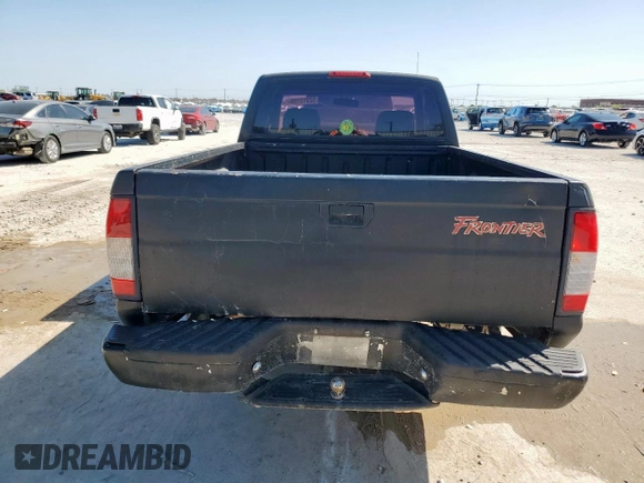 2001 Nissan Frontier XE z VIN 1N6DD21SX1C386232, wystawiony jako Copart lot #52915155 z przebiegiem 174 268 mil mil oraz Czysty tytuł • Clean title. Historia ofert i sprzedaży dostępna na DreamBid. Obrazek 6.