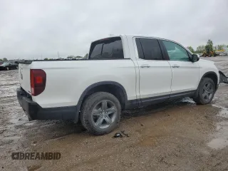 2023 Honda Ridgeline RTL-E with VIN 5FPYK3F78PB015187, listed as a Copart auction lot 57655465 with 57,704 mi miles and Salvage title. Bid and sale history available at DreamBid. Image 3.