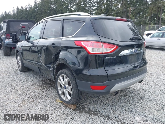 2014 Ford Escape Titanium with VIN 1FMCU9J95EUD60587, listed as a IAAI auction lot 42129854 with 155,559 mi miles and . Bid and sale history available at DreamBid. Image 3.