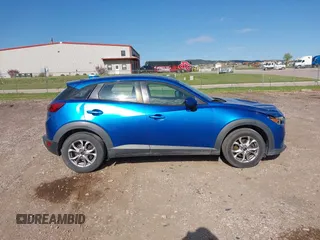 2016 Mazda CX-3 Sport z VIN JM1DKFB73G0140286, wystawiony jako IAAI lot #42235327 z przebiegiem 83 430 mil mil oraz . Historia ofert i sprzedaży dostępna na DreamBid. Obrazek 13.