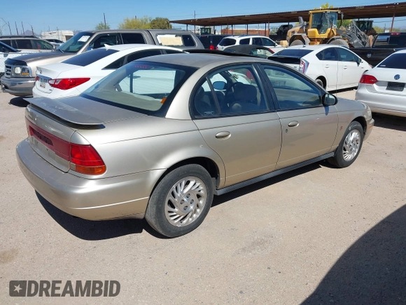 1998 Saturn SL z VIN 1G8ZK5271WZ129808, wystawiony jako IAAI lot #41993909 z przebiegiem 172 551 mil mil oraz . Historia ofert i sprzedaży dostępna na DreamBid. Obrazek 4.