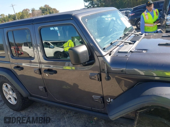 2020 Jeep Wrangler Unlimited Sport S with VIN 1C4HJXDG1LW237405, listed as a IAAI auction lot 40631451 with 60,256 mi miles and . Bid and sale history available at DreamBid. Image 13.
