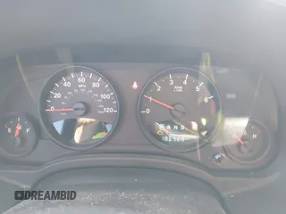 2011 Jeep Patriot Latitude with VIN 1J4NF1GB1BD258633, listed as a IAAI auction lot 41955663 with 186,929 mi miles and . Bid and sale history available at DreamBid. Image 7.