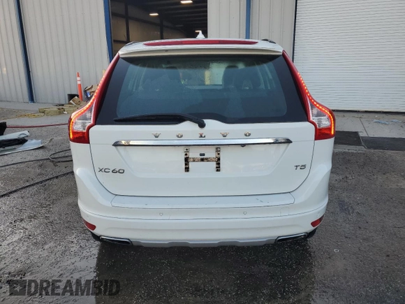 2016 Volvo XC60 T5 Drive-E z VIN YV440MDJ8G2921244, wystawiony jako Copart lot #75293814 z przebiegiem 132 314 mil mil oraz Szkoda całkowita • Salvage title. Historia ofert i sprzedaży dostępna na DreamBid. Obrazek 6.