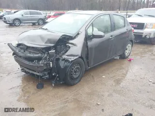 2012 Toyota Yaris L with VIN JTDKTUD34CD524342, listed as a IAAI auction lot 41571712 with 135,744 mi miles. Bid and sale history available at carsss.com. Image 2.