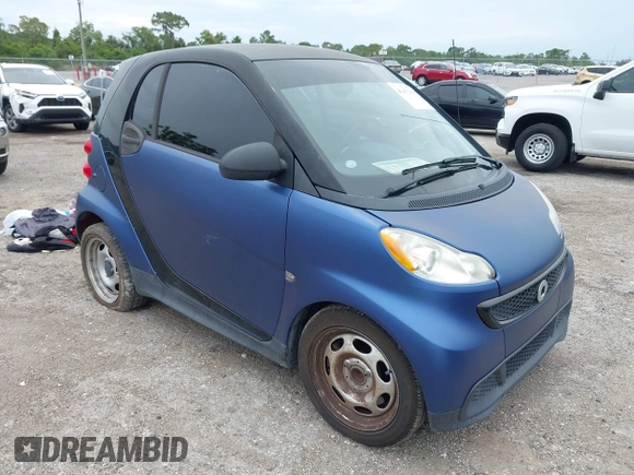 2013 Smart fortwo Pure with VIN WMEEJ3BA6DK664115, listed as a IAAI auction lot 42412198 with 64,522 mi miles and . Bid and sale history available at DreamBid. Image 1.