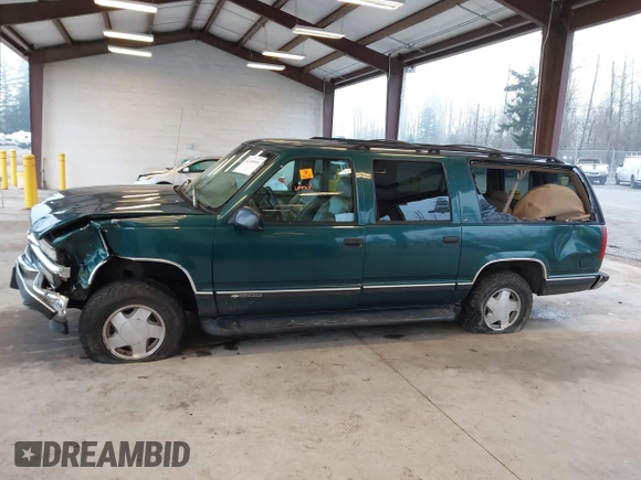1997 Chevrolet Suburban with VIN 3GNFK16R6VG118242, listed as a IAAI auction lot 41349416 with 183,439 mi miles. Bid and sale history available at carsss.com. Image 14.