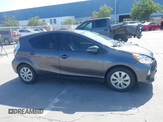 2014 Toyota Prius One with VIN JTDKDTB33E1061088, listed as a IAAI auction lot 42040762 with 206,735 mi miles and . Bid and sale history available at DreamBid. Image 13.
