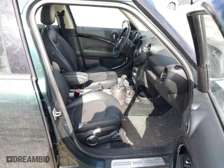 2013 MINI Cooper Countryman with VIN WMWZB3C58DWM09440, listed as a IAAI auction lot 41696396 with 52,930 mi miles. Bid and sale history available at carsss.com. Image 5.