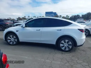 2023 Tesla Model Y Long Range with VIN 7SAYGDEE9PA094191, listed as a IAAI auction lot 41906319 with 15,240 mi miles and . Bid and sale history available at DreamBid. Image 15.