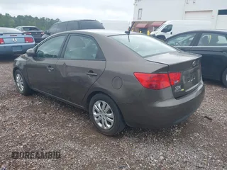 2013 Kia Forte EX with VIN KNAFU4A25D5719014, listed as a IAAI auction lot 42079529 with 222,801 mi miles. Bid and sale history available at carsss.com. Image 3.