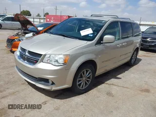 2014 Dodge Grand Caravan SXT with VIN 2C4RDGCG6ER466459, listed as a IAAI auction lot 41820907 with 105,404 mi miles and . Bid and sale history available at DreamBid. Image 20.