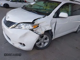 2014 Toyota Sienna LE AAS with VIN 5TDKK3DC2ES434546, listed as a IAAI auction lot 42227745 with 175,445 mi miles and . Bid and sale history available at DreamBid. Image 17.
