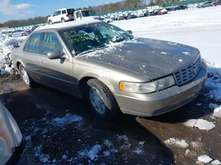 2001 Cadillac Seville Luxury SLS z VIN 1G6KS54YX1U103892, wystawiony jako IAAI lot #41550499 z przebiegiem Nie podano mil oraz . Historia ofert i sprzedaży dostępna na DreamBid. Obrazek 1.