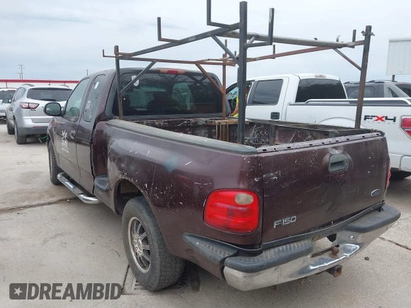 2001 Ford F-150 XL with VIN 2FTRX07W31CA59129, listed as a IAAI auction lot 41349352 with 272,026 mi miles. Bid and sale history available at carsss.com. Image 3.