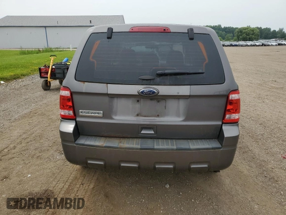 2012 Ford Escape XLS с VIN 1FMCU0C78CKB63817, выставлен на аукционе Copart как лот 64386755 с пробегом 114 415 миль миль и Чистый • Clean title. История ставок и продаж доступна на DreamBid. Изображение 6.