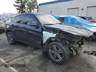2016 BMW X6 sDrive35i with VIN 5UXKU0C54G0F93393, listed as a Copart auction lot 39393874 with 103,254 mi miles. Bid and sale history available at carsss.com. Image 4.