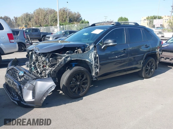 2023 Toyota RAV4 Hybrid XSE with VIN 4T3E6RFV6PU120175, listed as a IAAI auction lot 42499631 with 27,452 mi miles and . Bid and sale history available at DreamBid. Image 2.