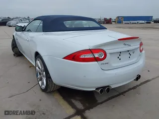 2014 Jaguar XK with VIN SAJWA4EC9EMB52042, listed as a IAAI auction lot 41635233 with 10,566 mi miles. Bid and sale history available at carsss.com. Image 3.