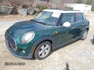 2016 MINI Hardtop 4 Door with VIN WMWXU1C57G2D09401, listed as a IAAI auction lot 42013695 with 43,437 mi miles and . Bid and sale history available at DreamBid. Image 2.