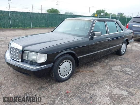 1990 Mercedes-Benz 560 with VIN WDBCA39E4LA534349, listed as a IAAI auction lot 42201056 with 211,470 mi miles and . Bid and sale history available at DreamBid. Image 2.