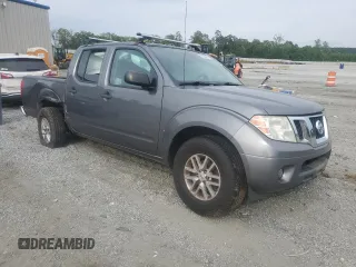 2016 Nissan Frontier SV with VIN 1N6AD0ER1GN904465, listed as a Copart auction lot 57233355 with 167,433 mi miles and Salvage title. Bid and sale history available at DreamBid. Image 4.