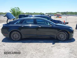 2015 Lincoln MKZ с VIN 3LN6L2G97FR619264, выставлен на аукционе IAAI как лот 42030235 с пробегом 116 727 миль миль и . История ставок и продаж доступна на DreamBid. Изображение 13.