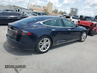 2014 Tesla Model S 60 with VIN 5YJSA1H12EFP61355, listed as a Copart auction lot 59709065 with 109,446 mi miles and Salvage title. Bid and sale history available at DreamBid. Image 3.