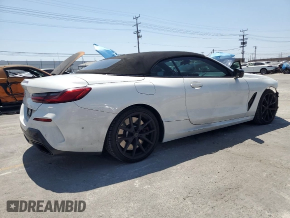 2019 BMW 8 Series M850i xDrive z VIN WBAFY4C54KBX39166, wystawiony jako Copart lot #58597925 z przebiegiem 38 192 mil mil oraz Szkoda całkowita • Salvage title. Historia ofert i sprzedaży dostępna na DreamBid. Obrazek 3.