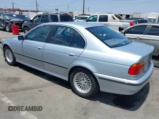 1997 BMW 5 Series 540i z VIN WBADE6324VBW51871, wystawiony jako IAAI lot #42505762 z przebiegiem 106 130 mil mil oraz . Historia ofert i sprzedaży dostępna na DreamBid. Obrazek 3.