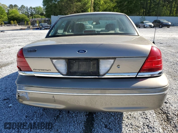 2005 Ford Crown Victoria LX z VIN 2FAFP74WX5X166506, wystawiony jako Copart lot #52141265 z przebiegiem 117 686 mil mil oraz Szkoda całkowita • Salvage title. Historia ofert i sprzedaży dostępna na DreamBid. Obrazek 6.