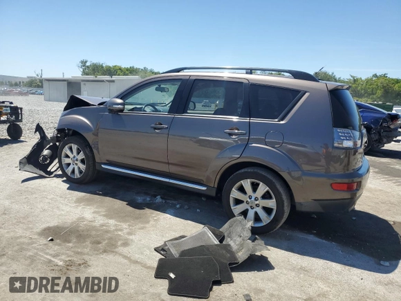 2010 Mitsubishi Outlander SE z VIN JA4AS3AW3AZ004523, wystawiony jako Copart lot #52864695 z przebiegiem 133 500 mil mil oraz Szkoda całkowita • Salvage title. Historia ofert i sprzedaży dostępna na DreamBid. Obrazek 2.