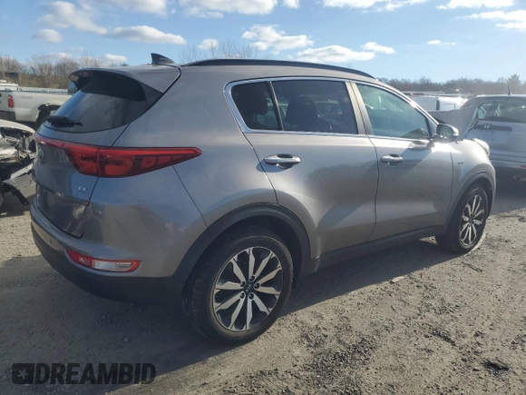 2018 Kia Sportage EX z VIN KNDPNCAC1J7308457, wystawiony jako Copart lot #81574704 z przebiegiem Nie podano mil oraz Szkoda całkowita • Salvage title. Historia ofert i sprzedaży dostępna na DreamBid. Obrazek 3.